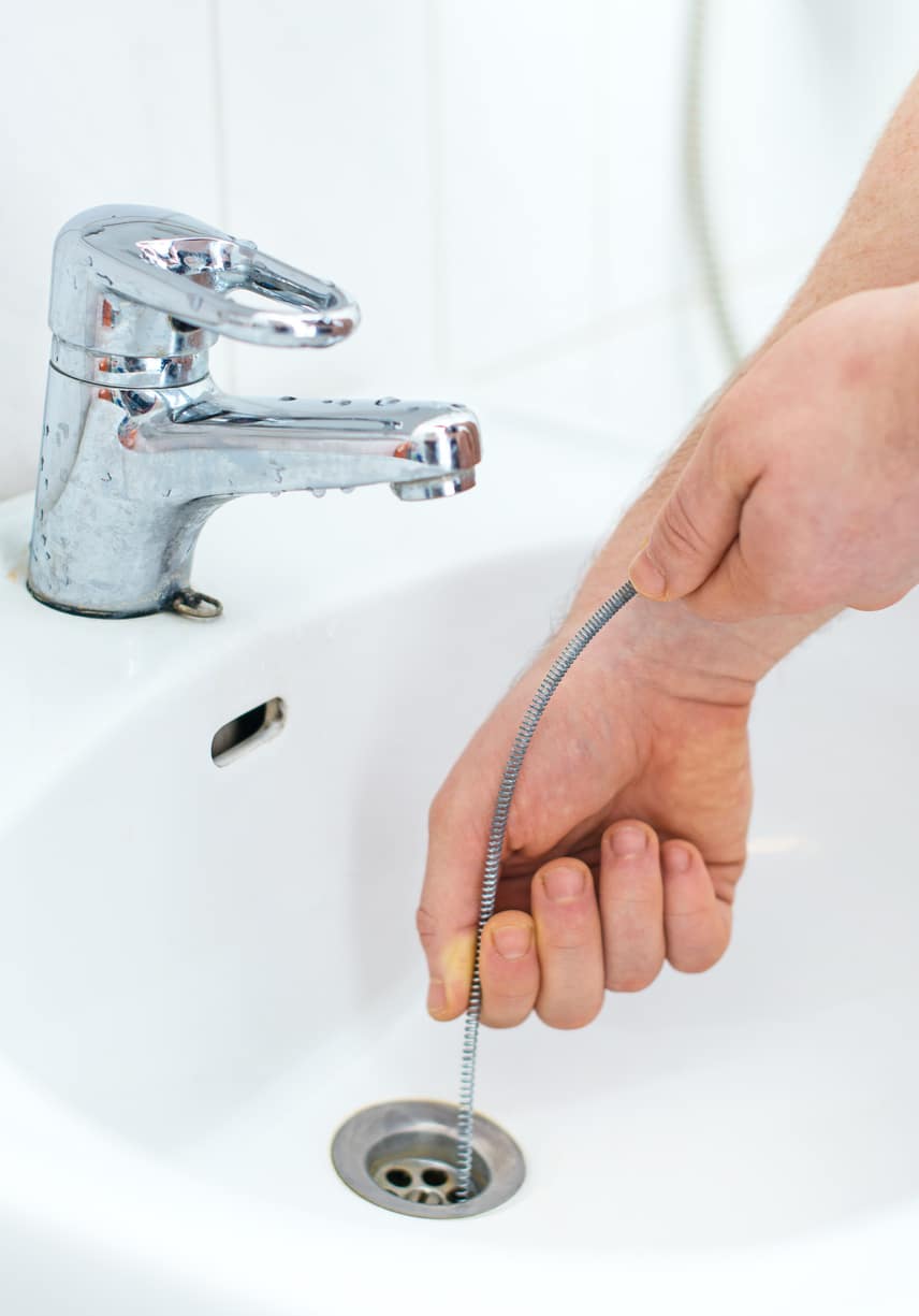Drain snake down a sink