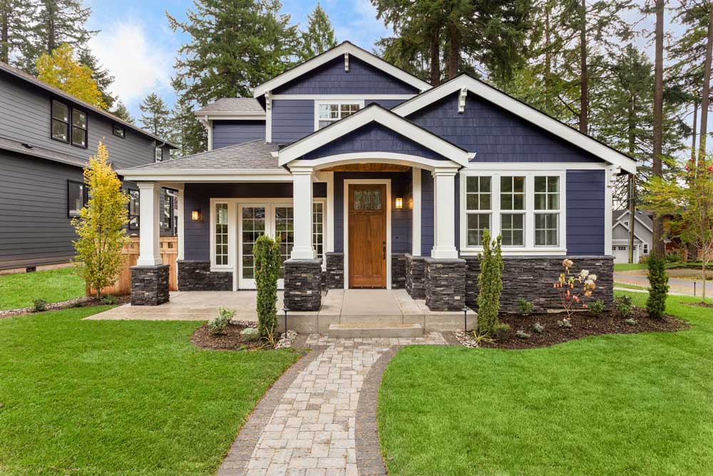 Blue house in Oregon with nonconforming sewer problems