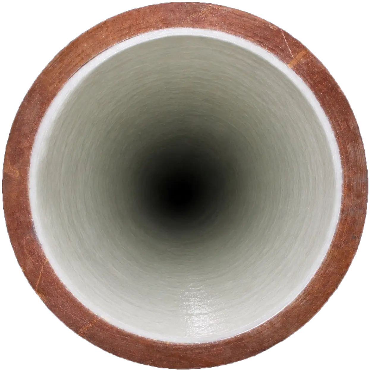 Interior view of pipe after CIPP cured-in-place lining repair, showing smooth white epoxy coating inside restored plumbing.