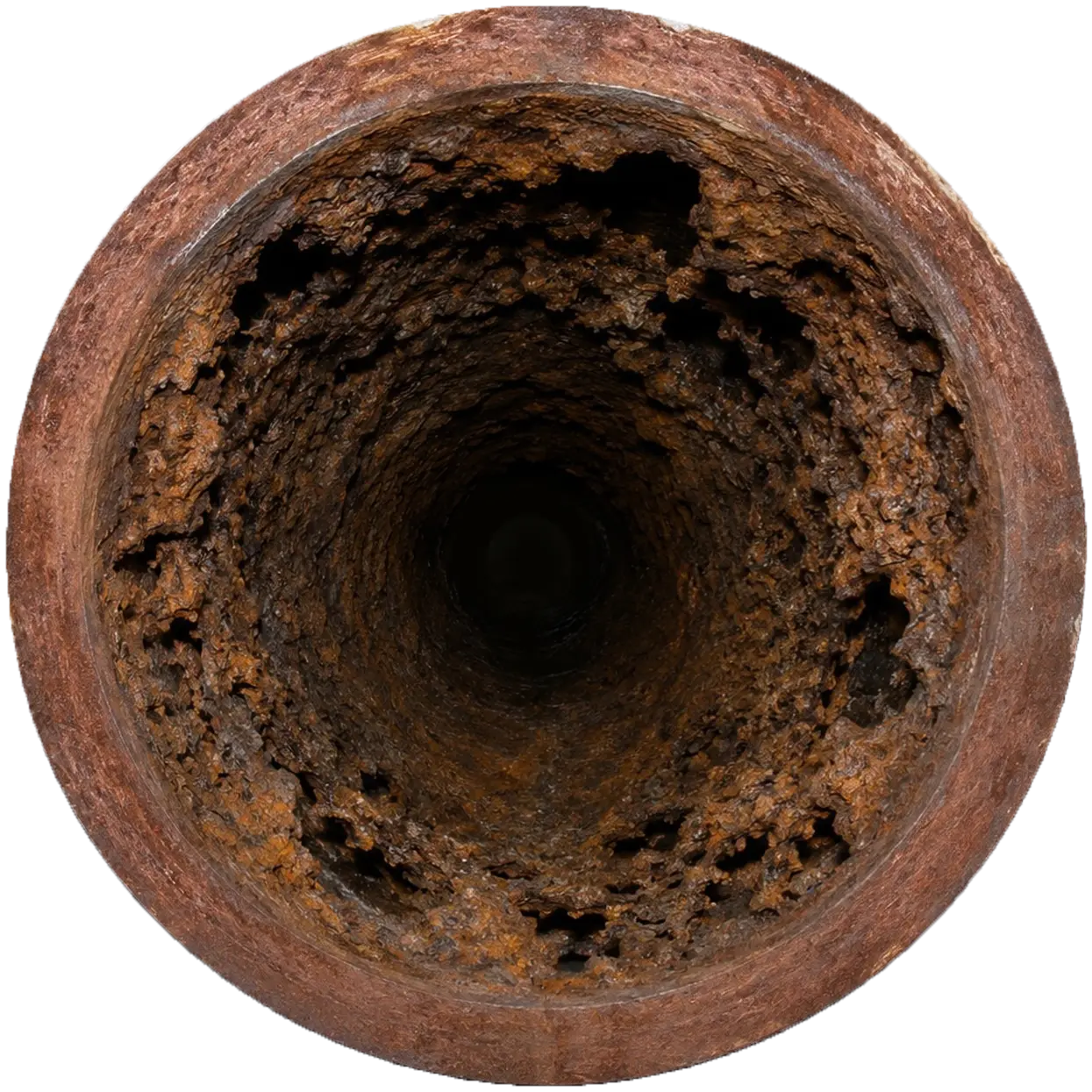 Interior view of corroded cast iron pipe with heavy rust buildup and mineral deposits before CIPP lining repair.